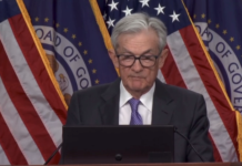 Fed delivers a quarter-point rate cut, flags risks